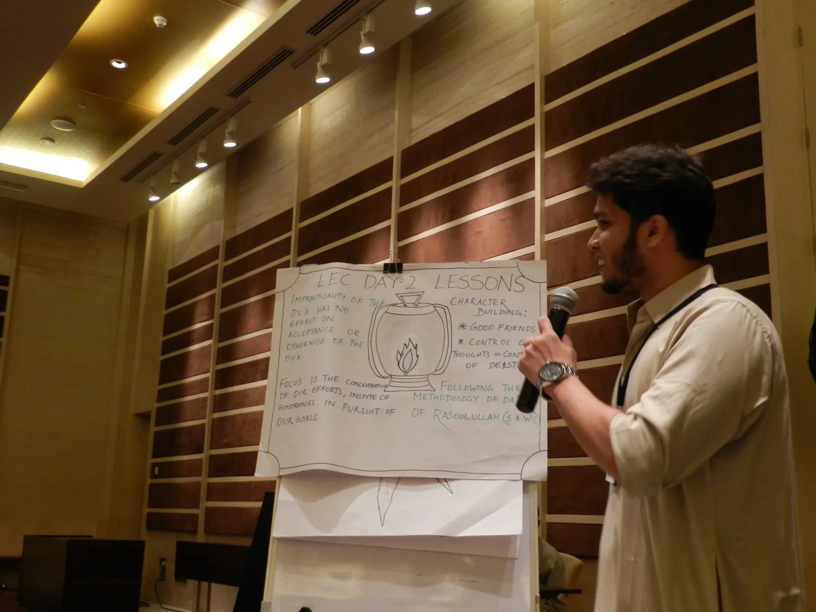 Participant presenting the lessons of day two